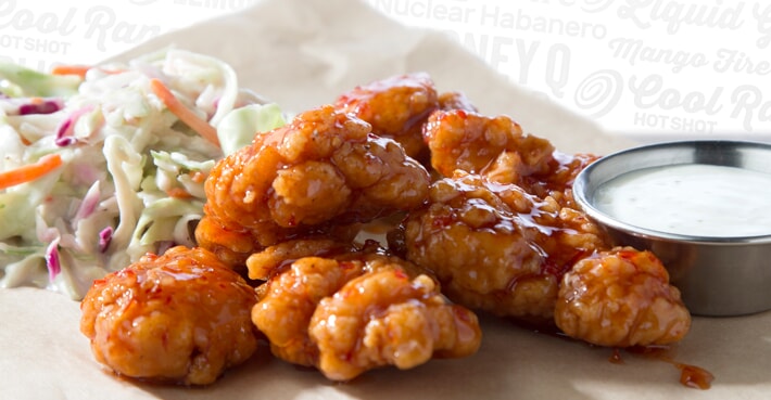 chicken wings and coleslaw